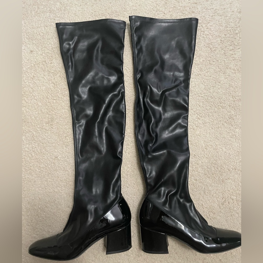 Black tall boots.